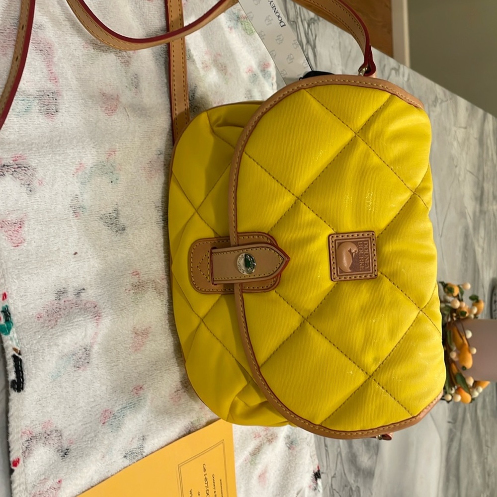 New Dooney and Bourke yellow quilted crossbody messenger bag.  New with tags